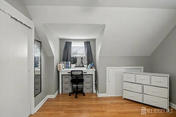 a view of a livingroom with furniture and front door