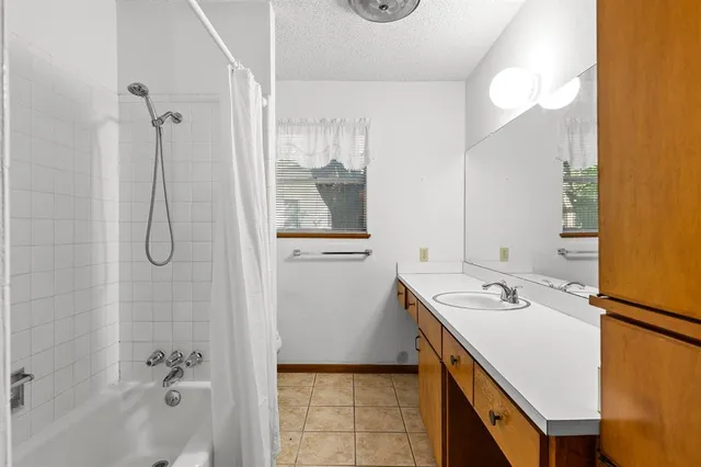 a view of entryway with wooden floor and door