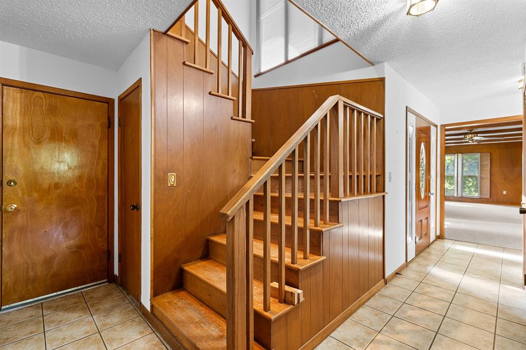 4500 Scottwood Drive Waco, TX 76708 - Photo 18 of 29 a view of entryway with wooden floor and door