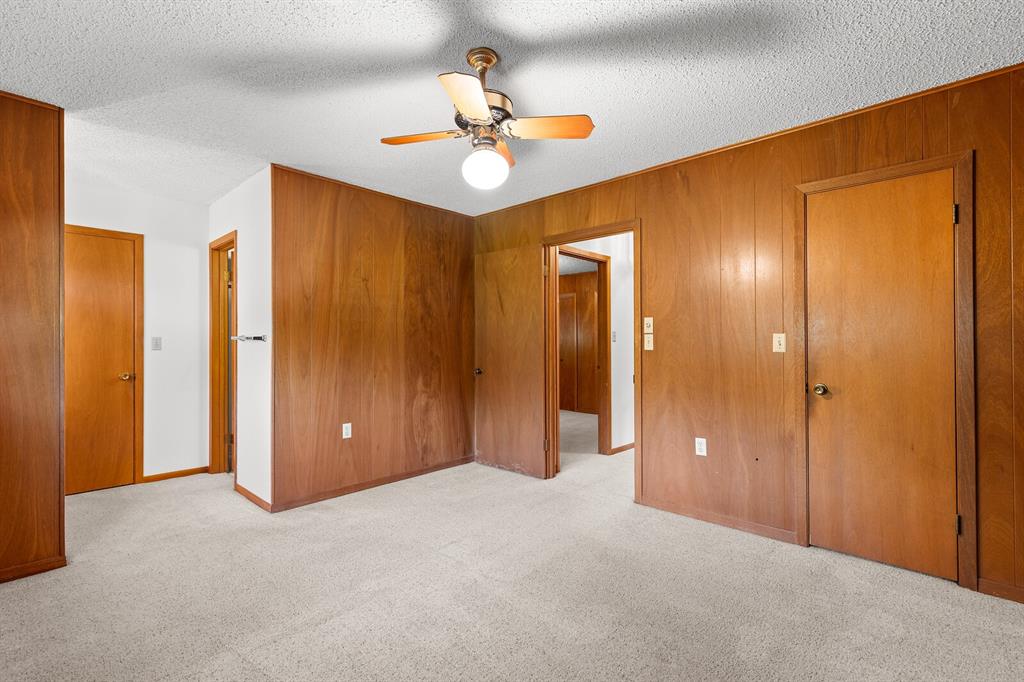 4500 Scottwood Drive Waco, TX 76708 - Photo 22 of 29 a view of an empty room with a chandelier fan