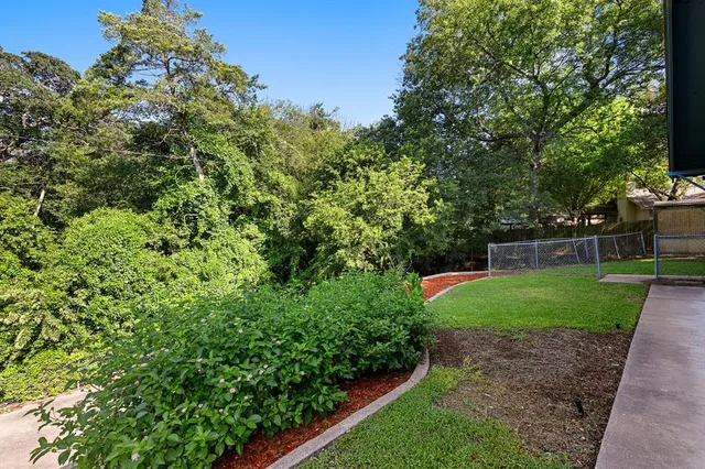 a view of a backyard with a garden
