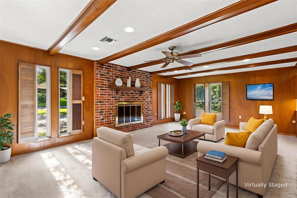 4500 Scottwood Drive Waco, TX 76708 - Photo 4 of 29 a living room with furniture and a fireplace