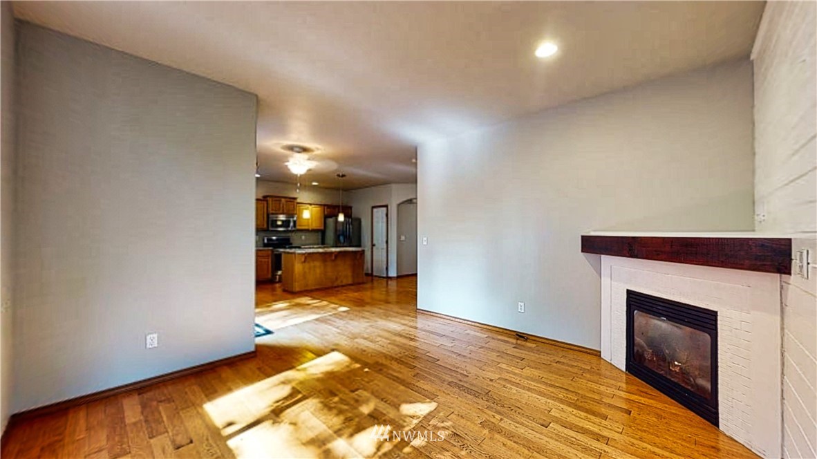 4524 147th Place Southeast Bothell, WA 98012 - Photo 12 of 33 a view of a living room with a fireplace