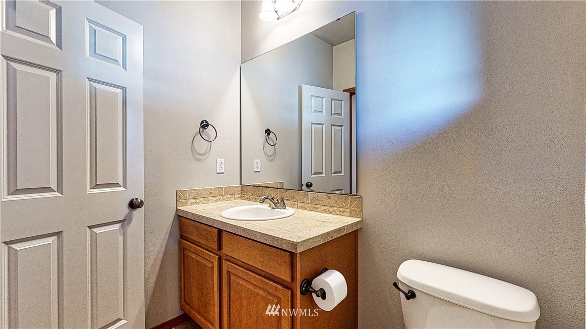 4524 147th Place Southeast Bothell, WA 98012 - Photo 13 of 33 a bathroom with a sink and a toilet