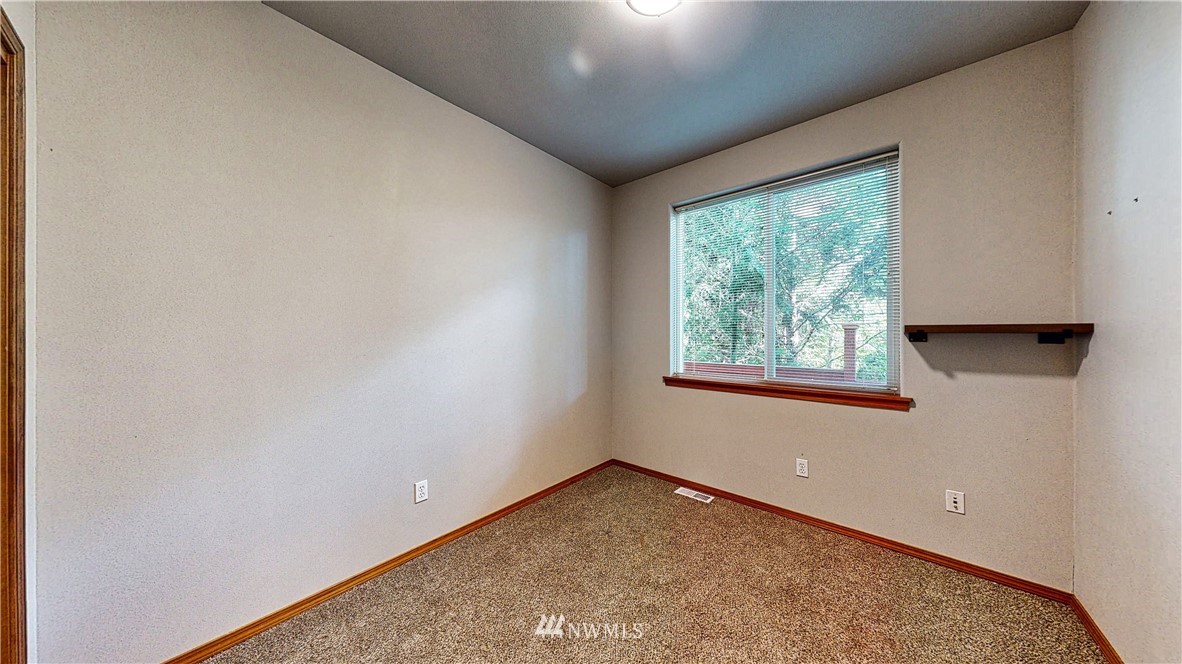 4524 147th Place Southeast Bothell, WA 98012 - Photo 14 of 33 an empty room with a window