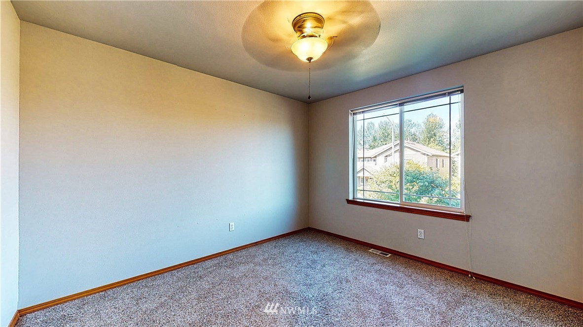 4524 147th Place Southeast Bothell, WA 98012 - Photo 24 of 33 an empty room with a window