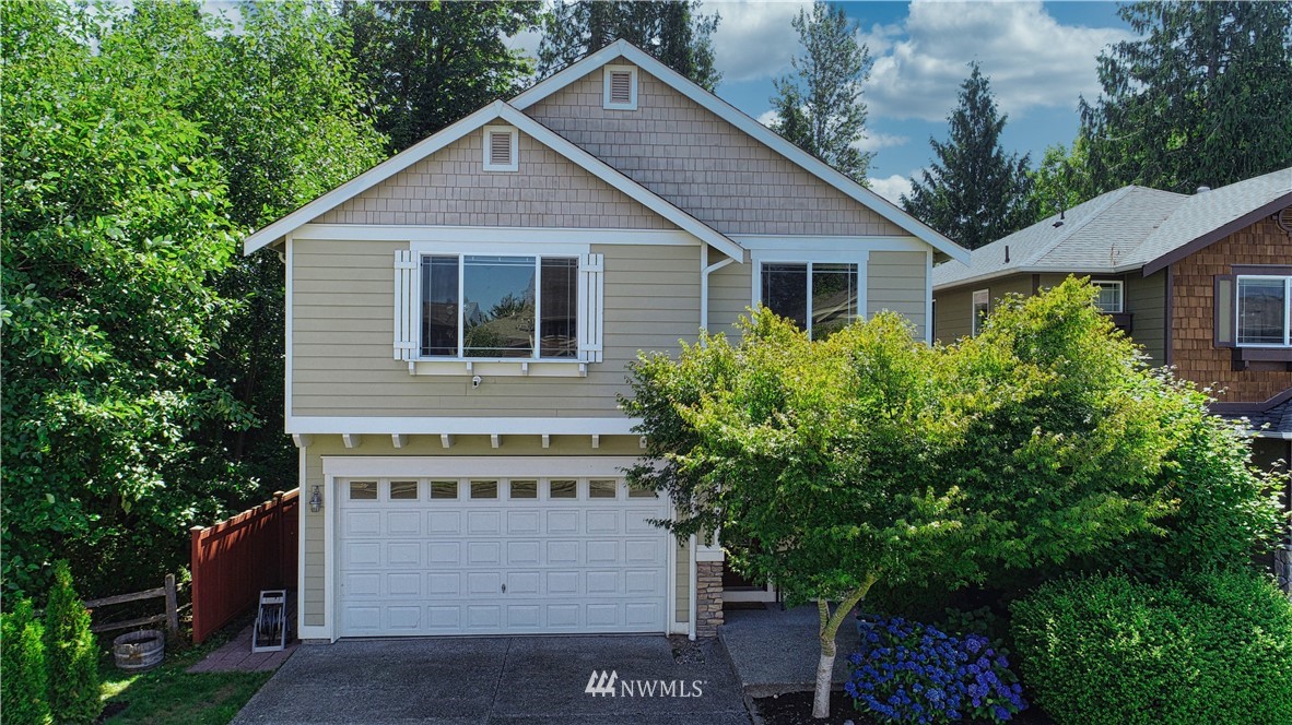 4524 147th Place Southeast Bothell, WA 98012 - Photo 33 of 33 a front view of a house with a garden