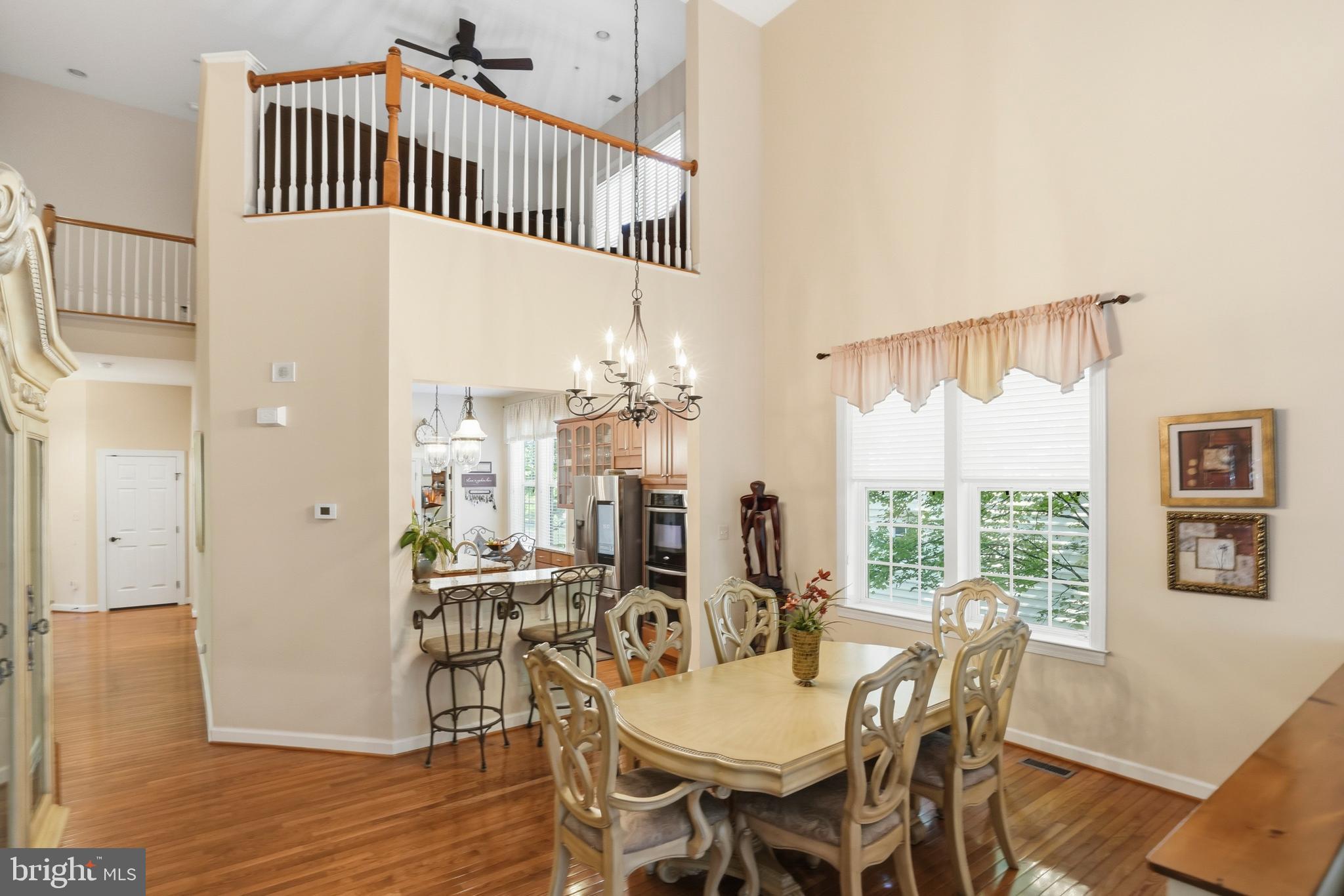 4109 Winterhazel Road, Unit 4109 Baltimore, MD 21208 - Photo 11 of 46 a view of a dining room with furniture and window