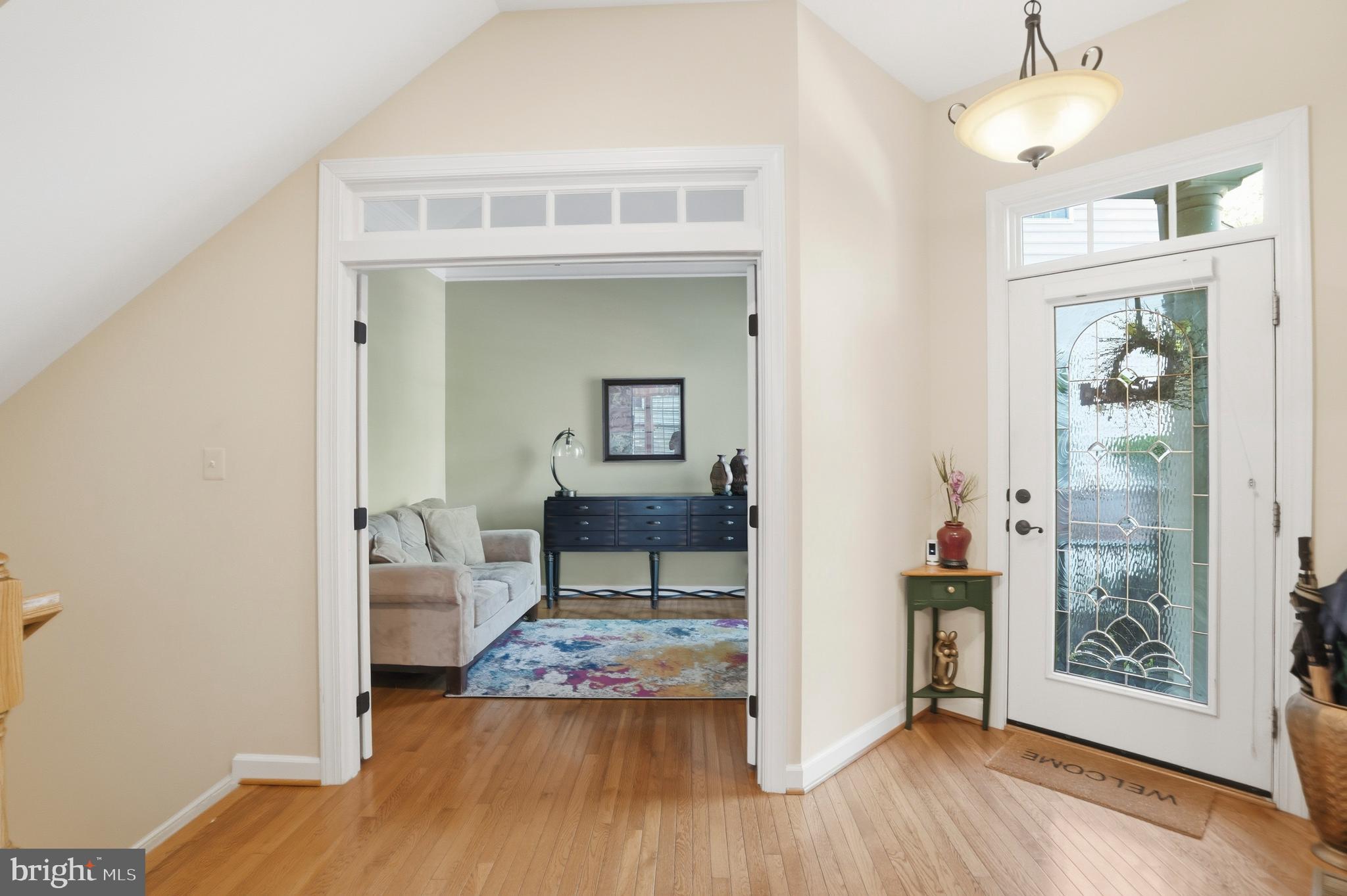 4109 Winterhazel Road, Unit 4109 Baltimore, MD 21208 - Photo 3 of 46 a living room with furniture and a wooden floor