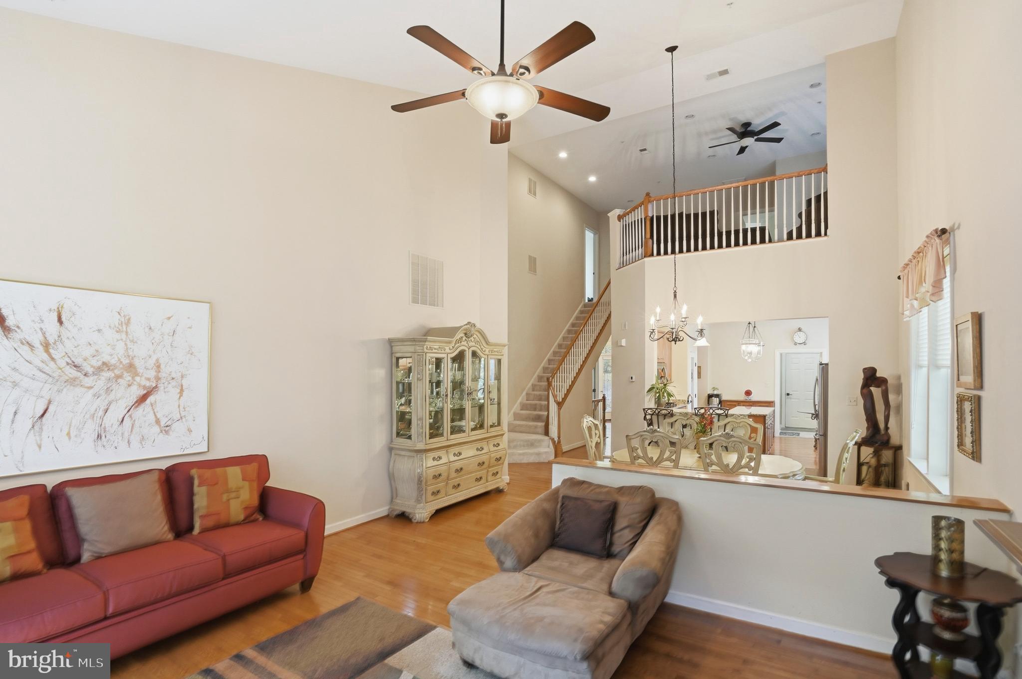 4109 Winterhazel Road, Unit 4109 Baltimore, MD 21208 - Photo 6 of 46 a living room with furniture and a large window
