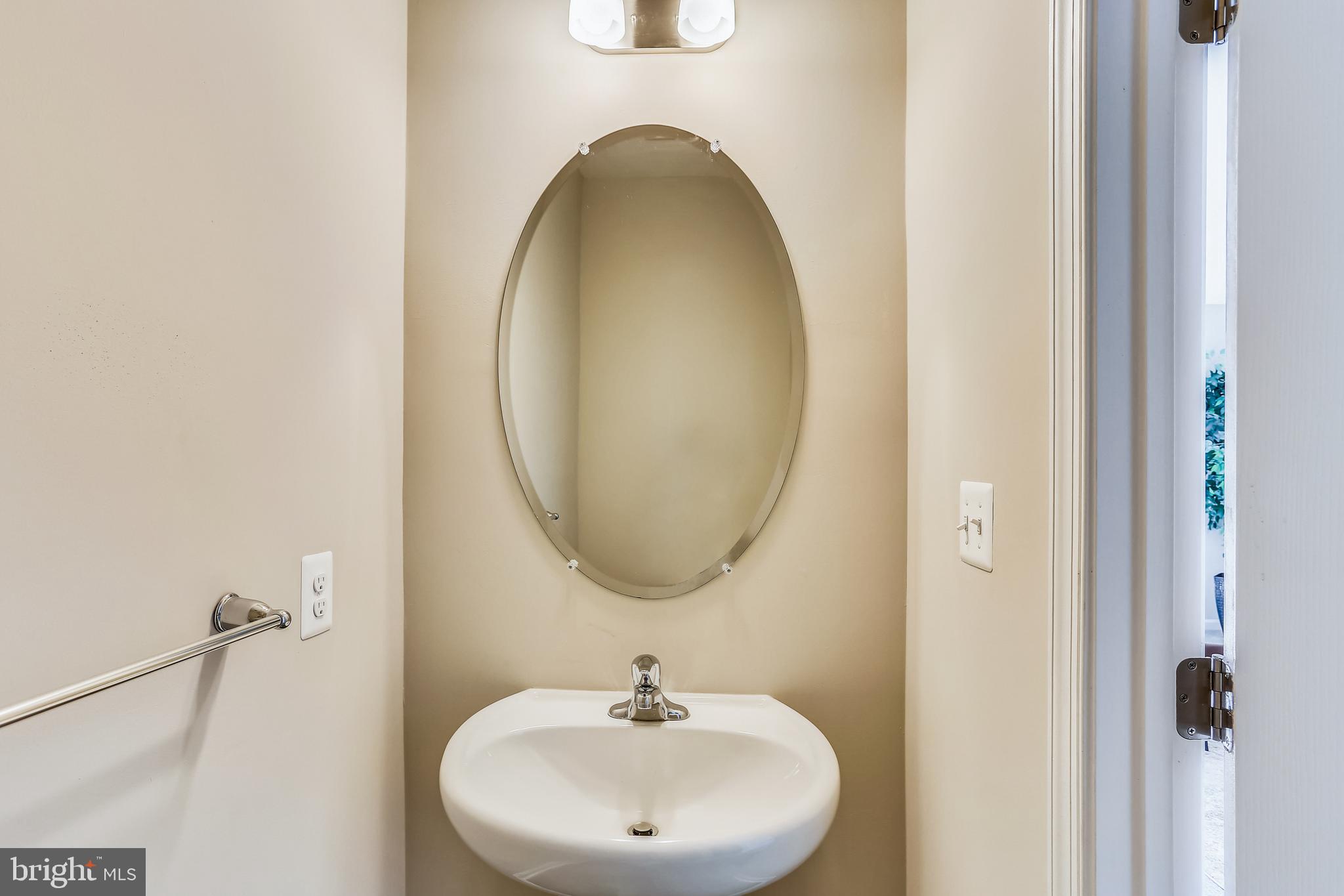 925 Dorchester Cove Road Hanover, MD 21076 - Photo 8 of 39 entry level powder room