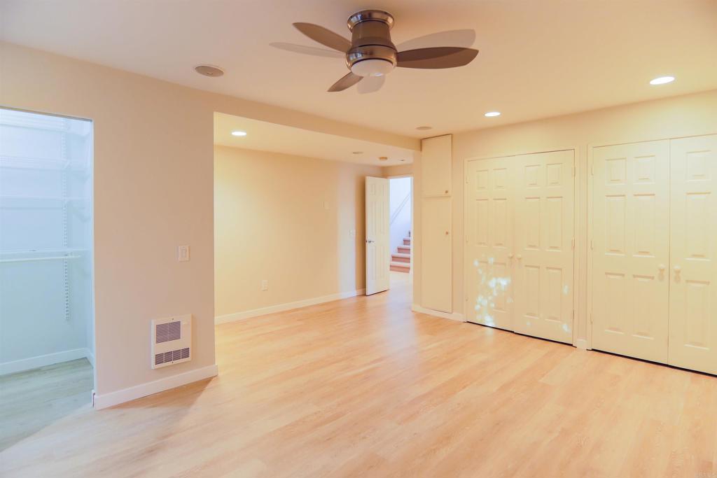 307 Shoemaker Lane Solana Beach, CA 92075 - Photo 14 of 31 a view of an empty room with a ceiling fan