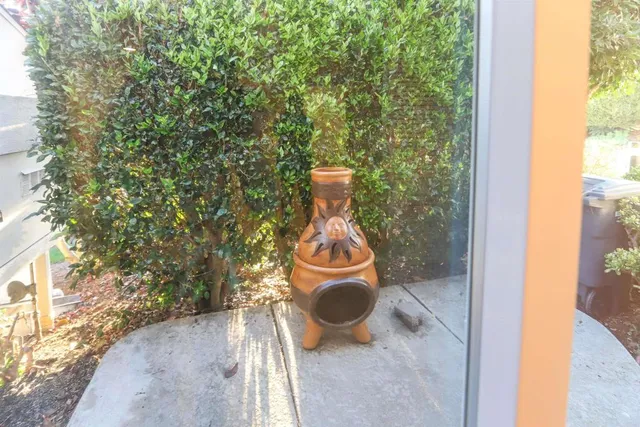 a view of a porch with garden