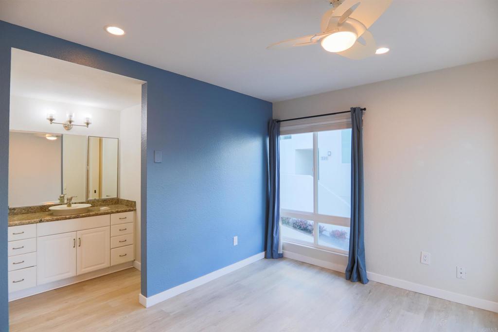 307 Shoemaker Lane Solana Beach, CA 92075 - Photo 23 of 31 a view of a kitchen with white cabinets