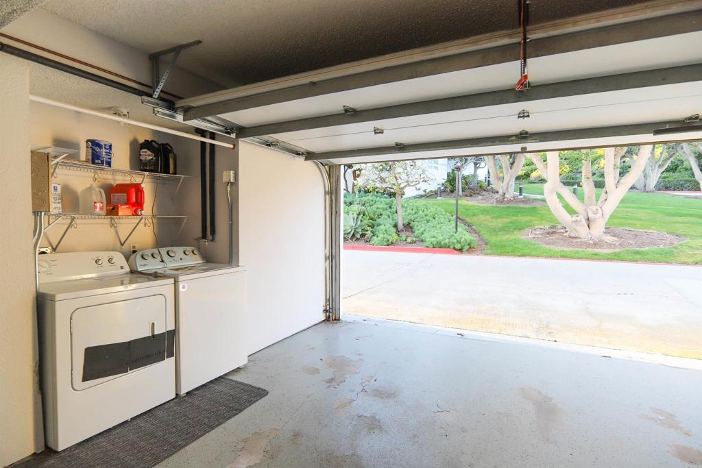 307 Shoemaker Lane Solana Beach, CA 92075 - Photo 25 of 31 a kitchen with stainless steel appliances granite countertop a stove and a refrigerator