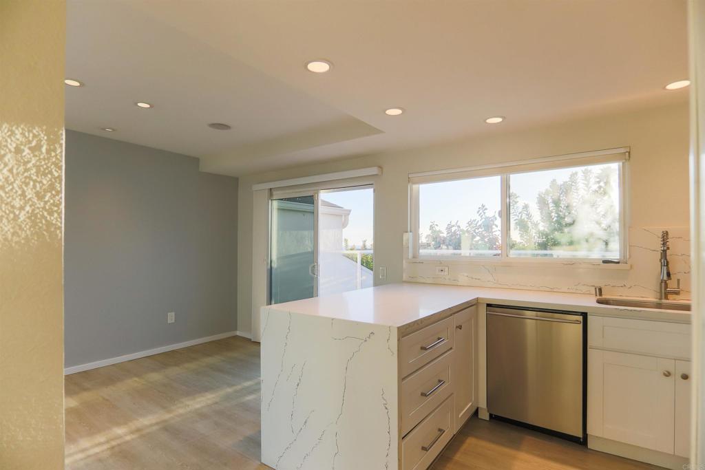 307 Shoemaker Lane Solana Beach, CA 92075 - Photo 7 of 31 a bathroom with a sink vanity and mirror