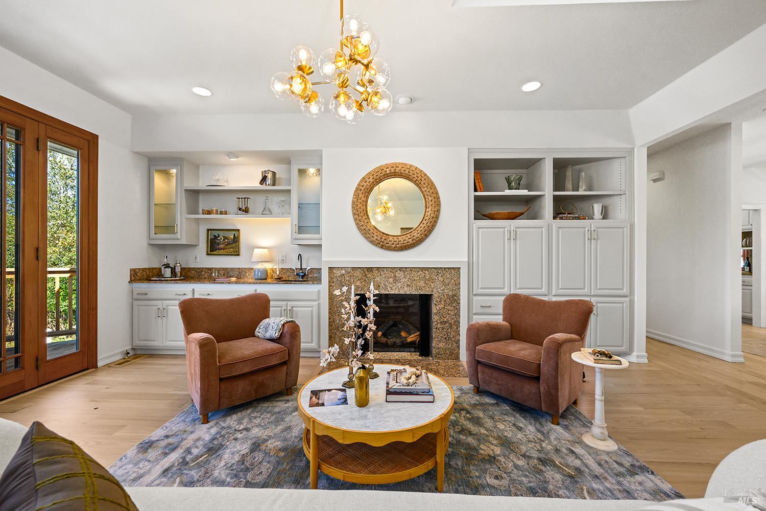 735 Johnson Street Healdsburg, CA 95448 - Photo 14 of 61 a living room with furniture a fireplace and a large window