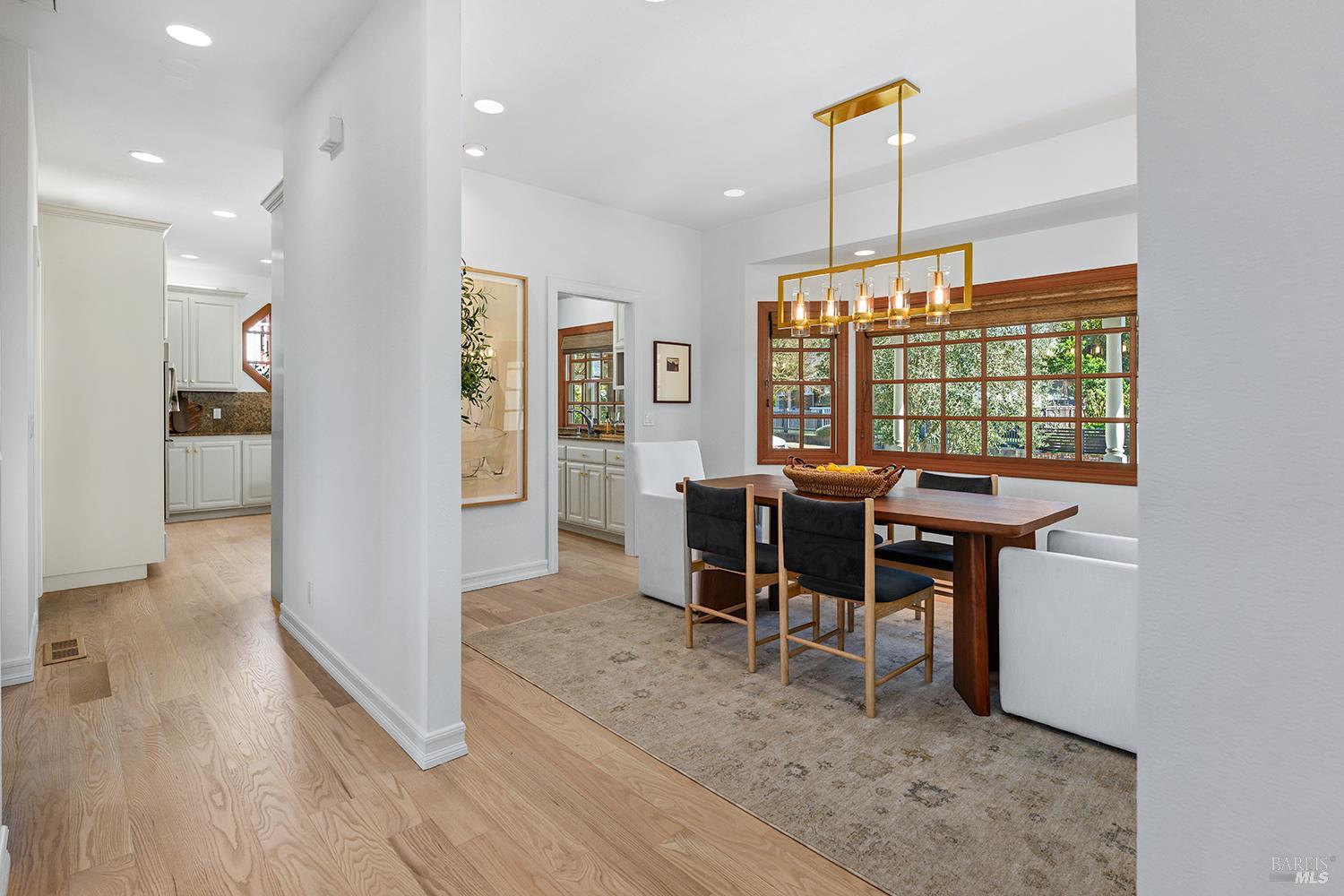 735 Johnson Street Healdsburg, CA 95448 - Photo 19 of 61 a view of a dining room with furniture window and wooden floor