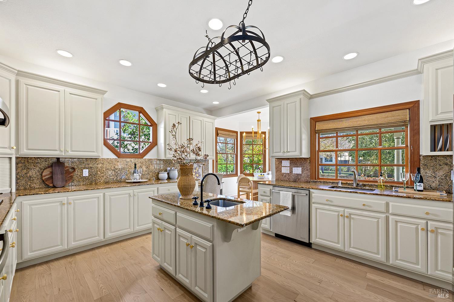 735 Johnson Street Healdsburg, CA 95448 - Photo 20 of 61 a kitchen with lots of counter top space sink and refrigerator