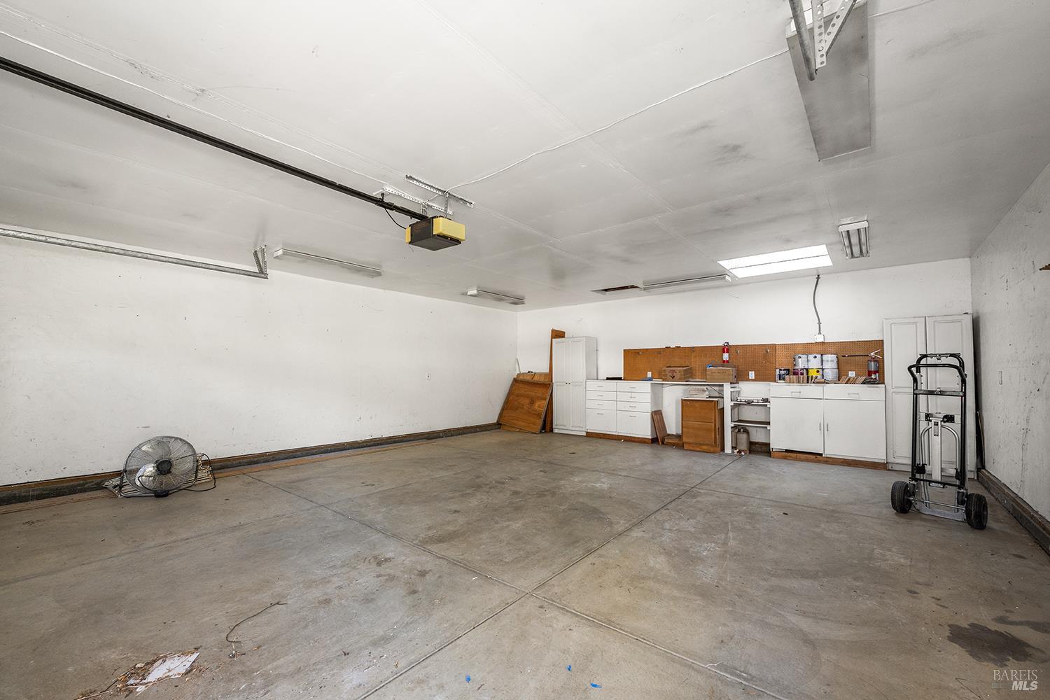735 Johnson Street Healdsburg, CA 95448 - Photo 56 of 61 a view of a garage with rack and bicycle