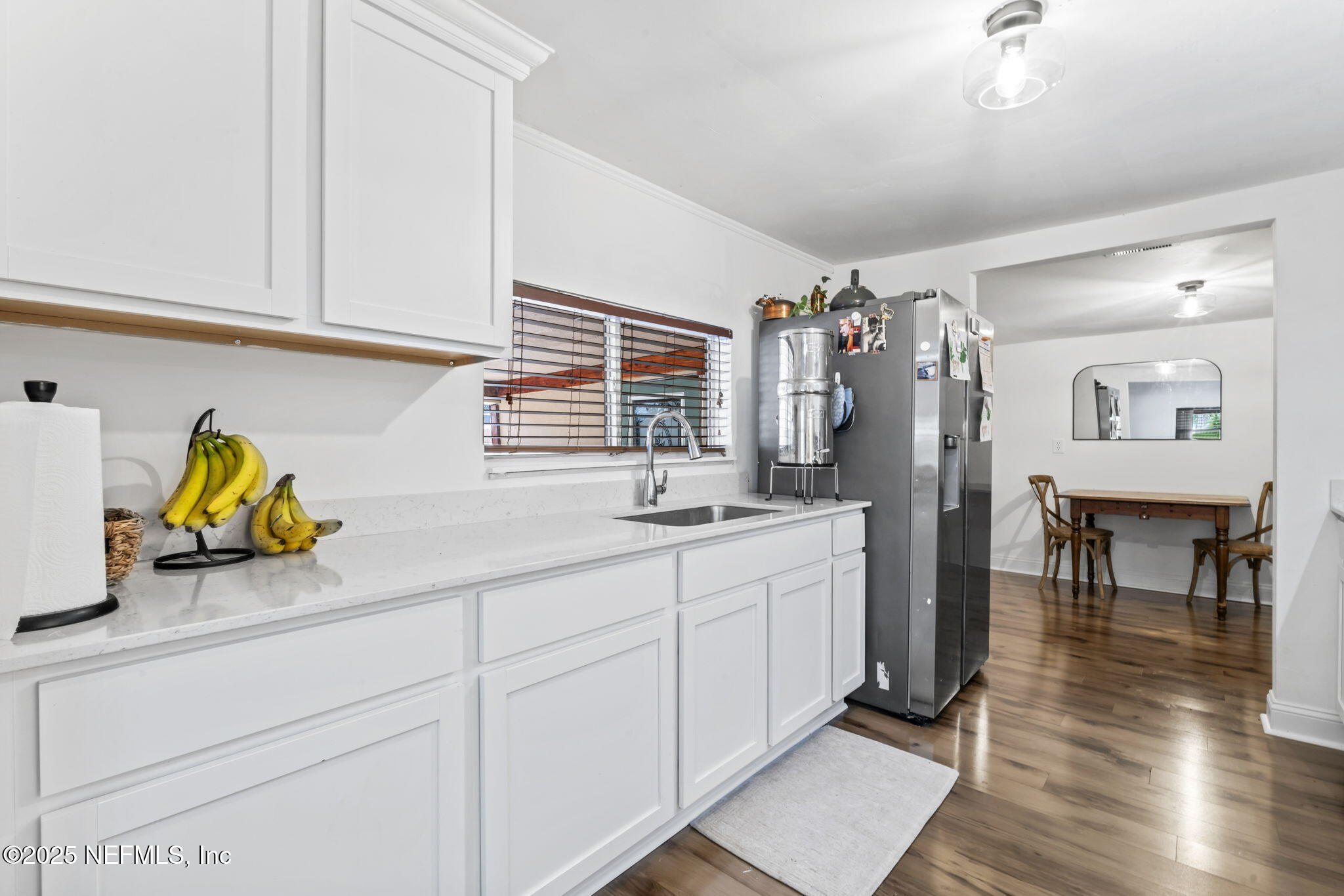 9160 Wild Road Jacksonville, FL 32220 - Photo 13 of 39 a kitchen with sink and cabinets