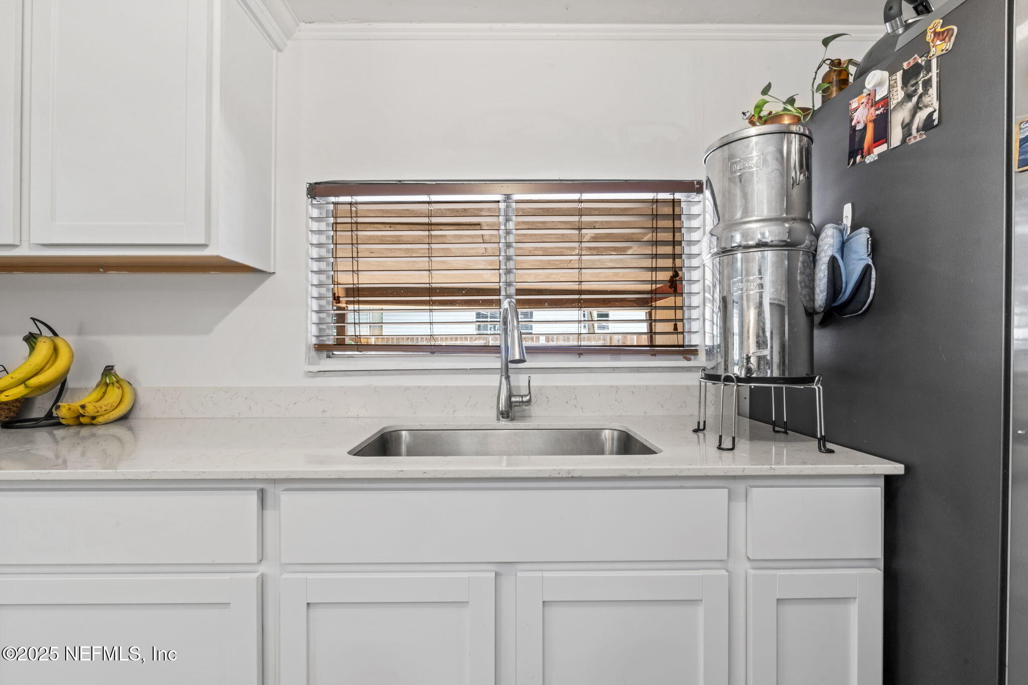 9160 Wild Road Jacksonville, FL 32220 - Photo 14 of 39 a kitchen with sink and a window