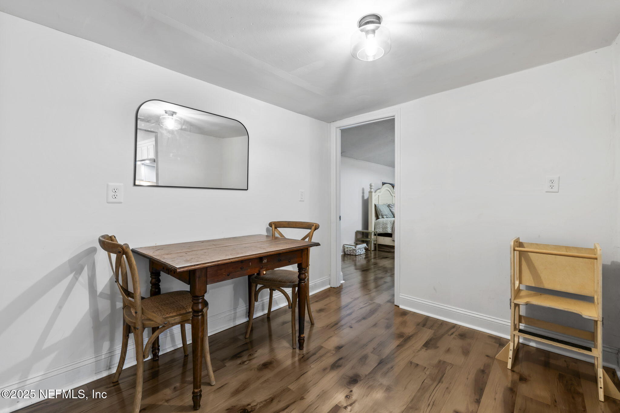 9160 Wild Road Jacksonville, FL 32220 - Photo 16 of 39 a view of a room that has a table and chairs in it