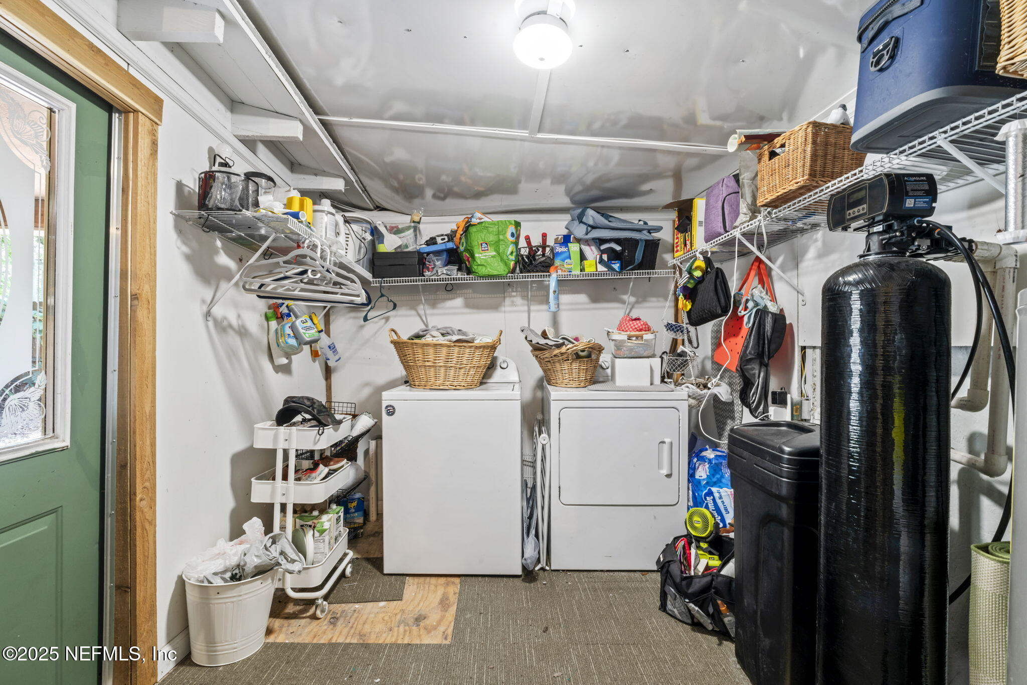 9160 Wild Road Jacksonville, FL 32220 - Photo 18 of 39 a view of storage and utility room