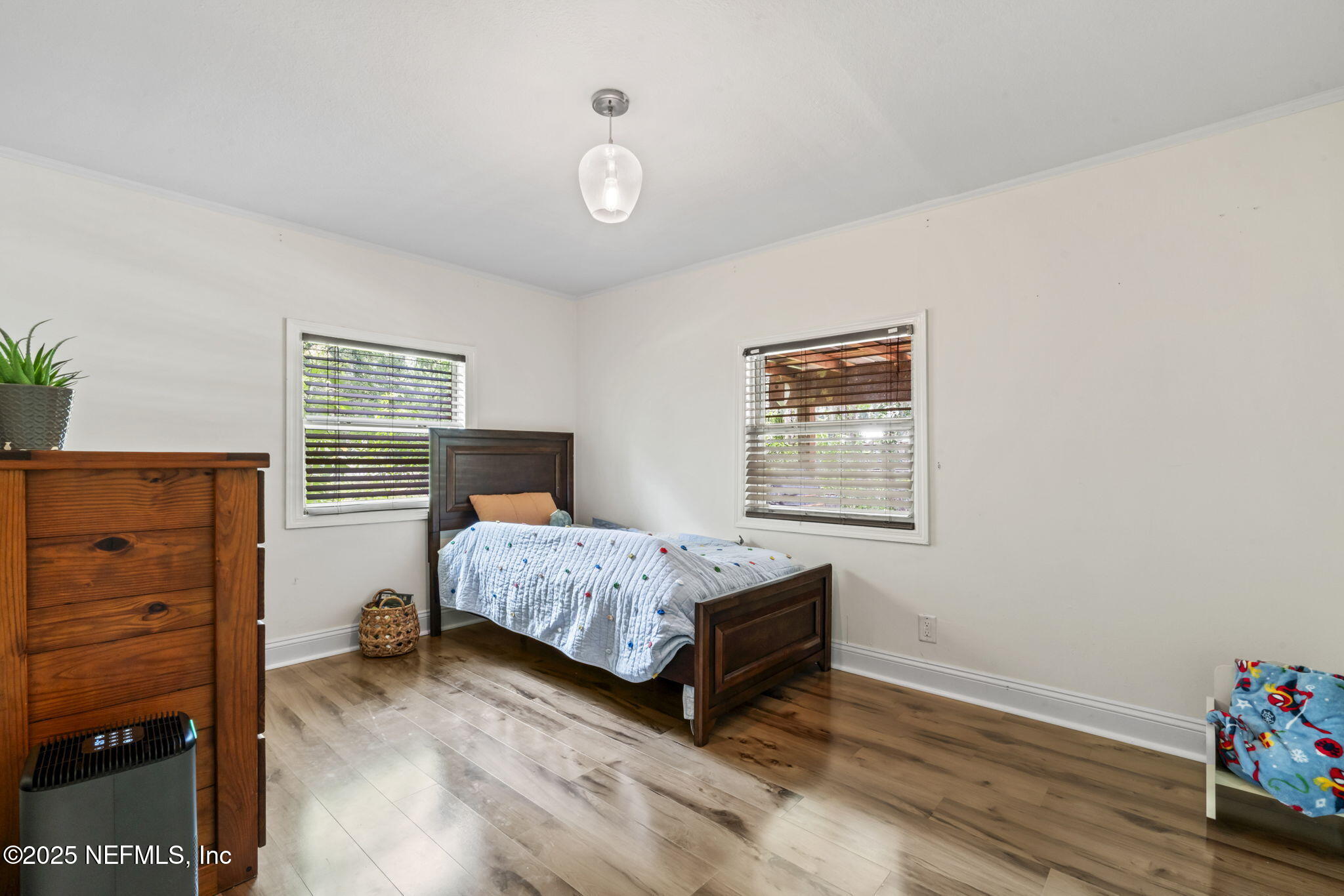 9160 Wild Road Jacksonville, FL 32220 - Photo 20 of 39 a bedroom with a bed and a window