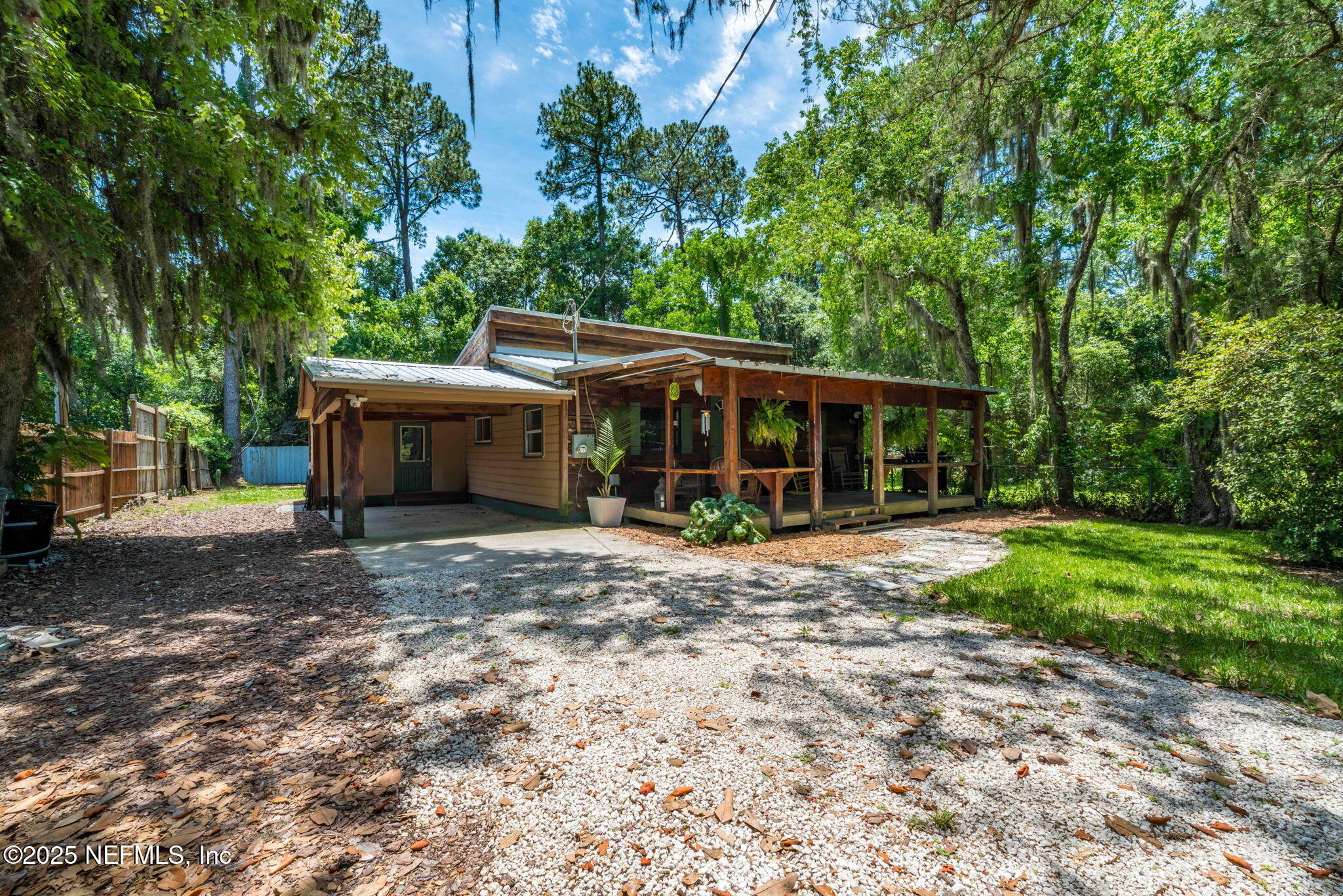 9160 Wild Road Jacksonville, FL 32220 - Photo 39 of 39 a front view of a house with a yard