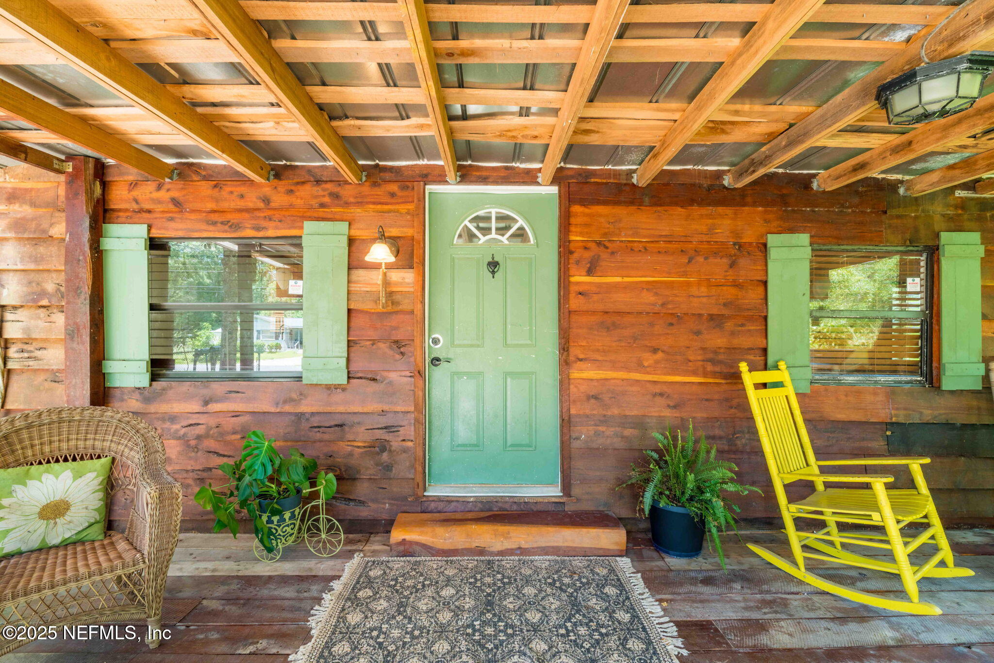 9160 Wild Road Jacksonville, FL 32220 - Photo 4 of 39 a view of a entryway door with wooden floor