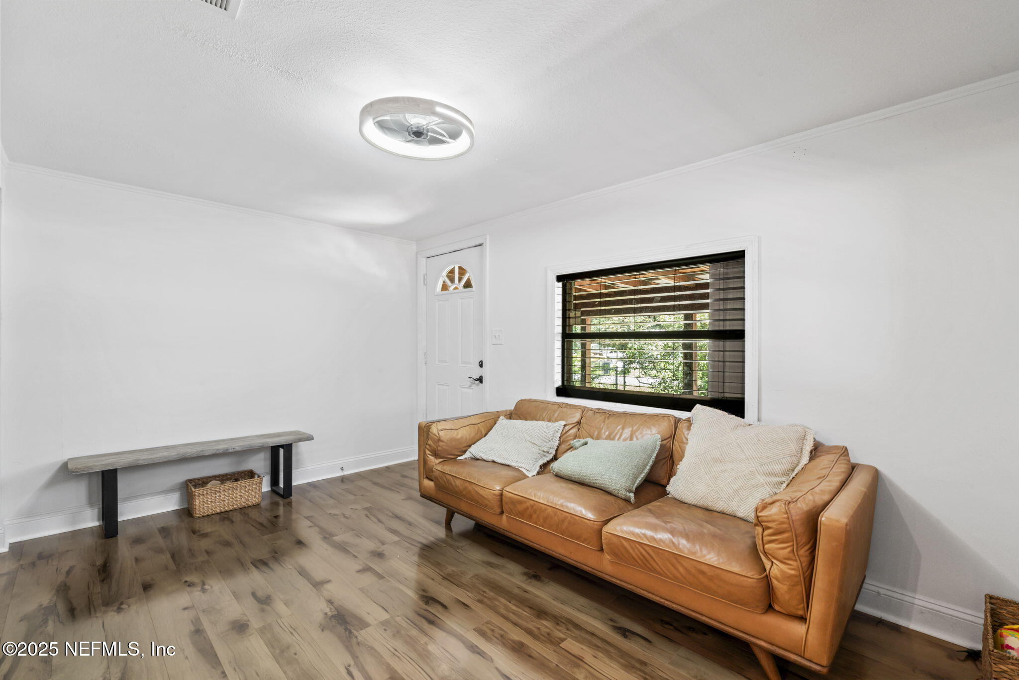 9160 Wild Road Jacksonville, FL 32220 - Photo 10 of 39 a living room with furniture and window