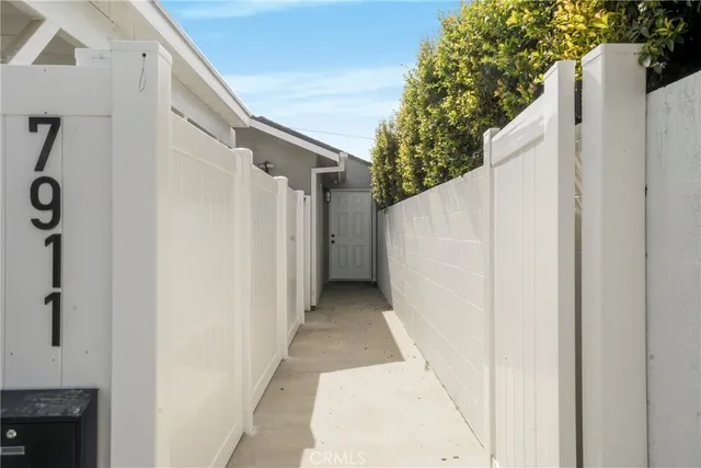 a view of yard with swimming pool and green space