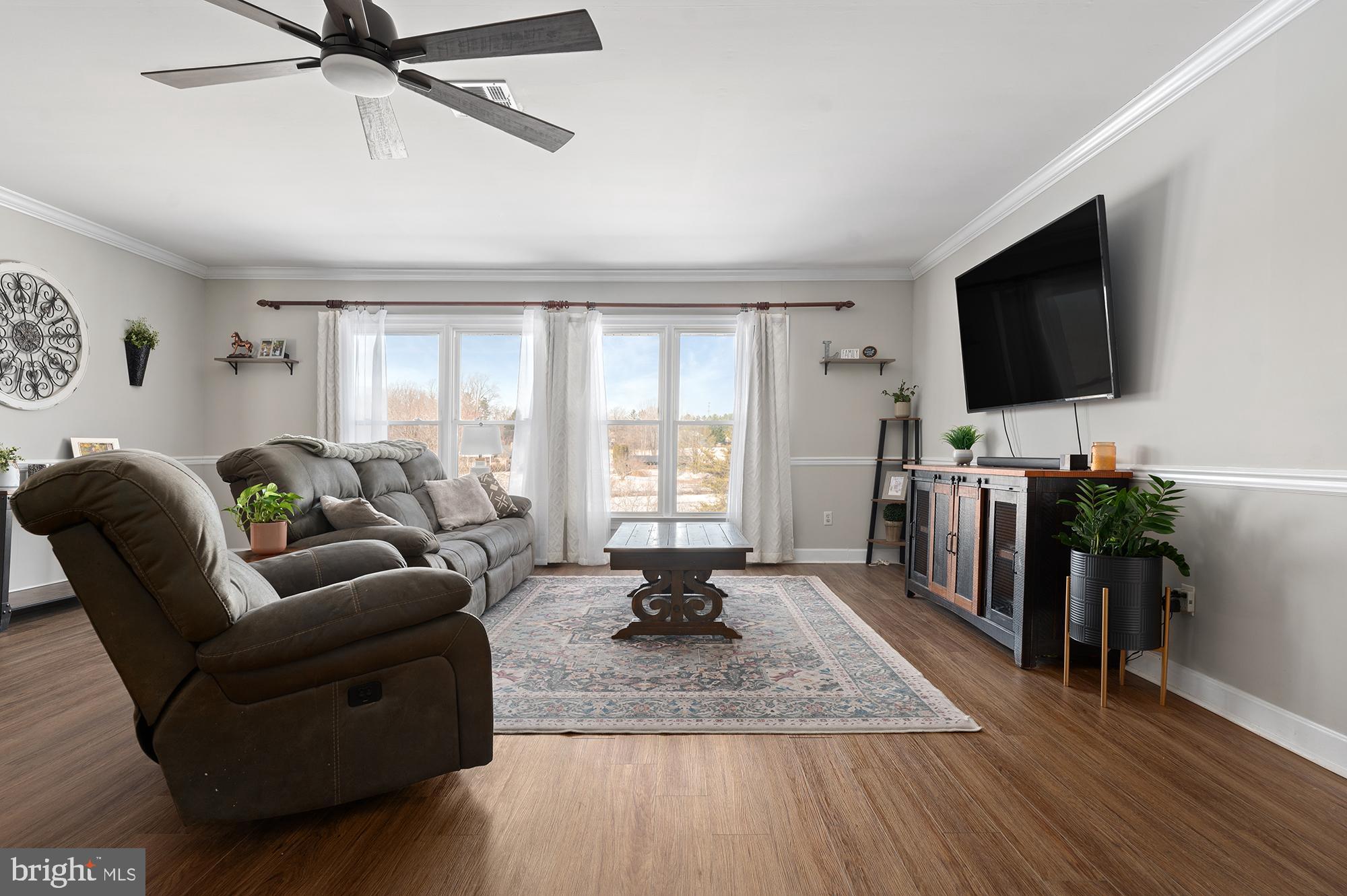 900 Union Church Road Elkton, MD 21921 - Photo 12 of 51 a living room with furniture and a flat screen tv