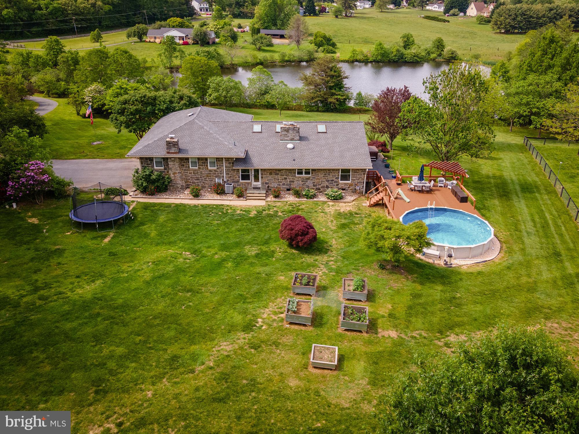 900 Union Church Road Elkton, MD 21921 - Photo 3 of 51 an aerial view of a house with yard swimming pool and outdoor seating