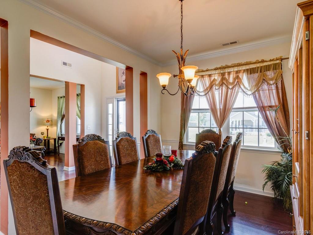 313 Roanoke Road Fletcher, NC 28732 - Photo 4 of 24 a dining room with furniture window and wooden floor