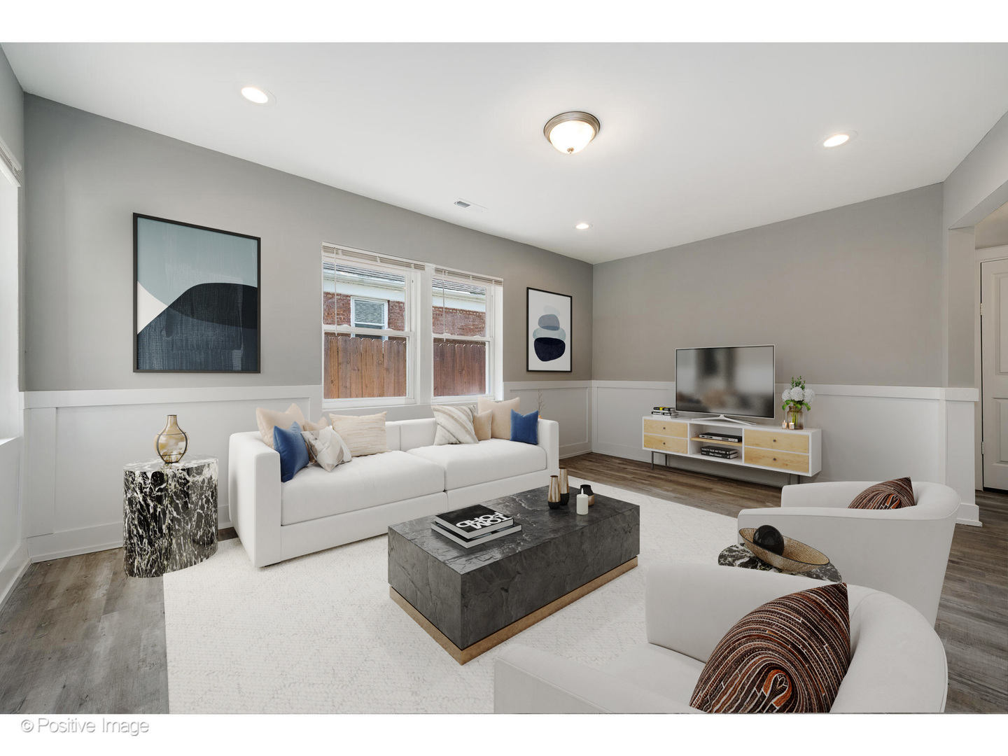 8446 South Constance Avenue Chicago, IL 60617 - Photo 3 of 14 a living room with furniture and a large window