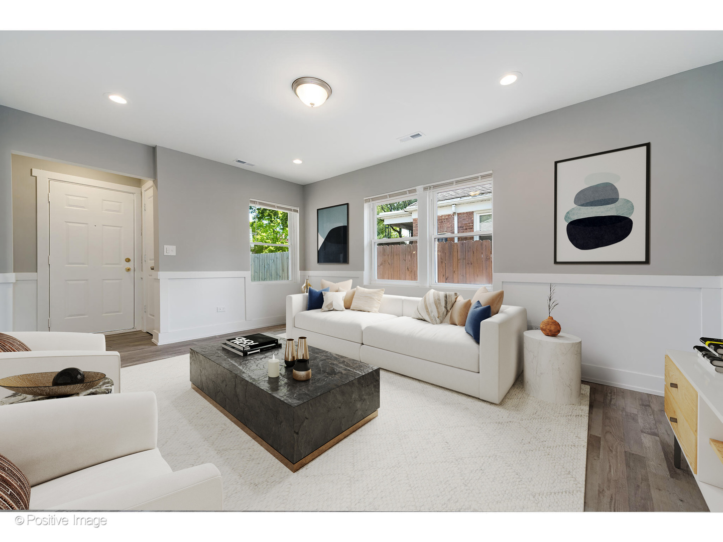 8446 South Constance Avenue Chicago, IL 60617 - Photo 4 of 14 a living room with furniture and a large window