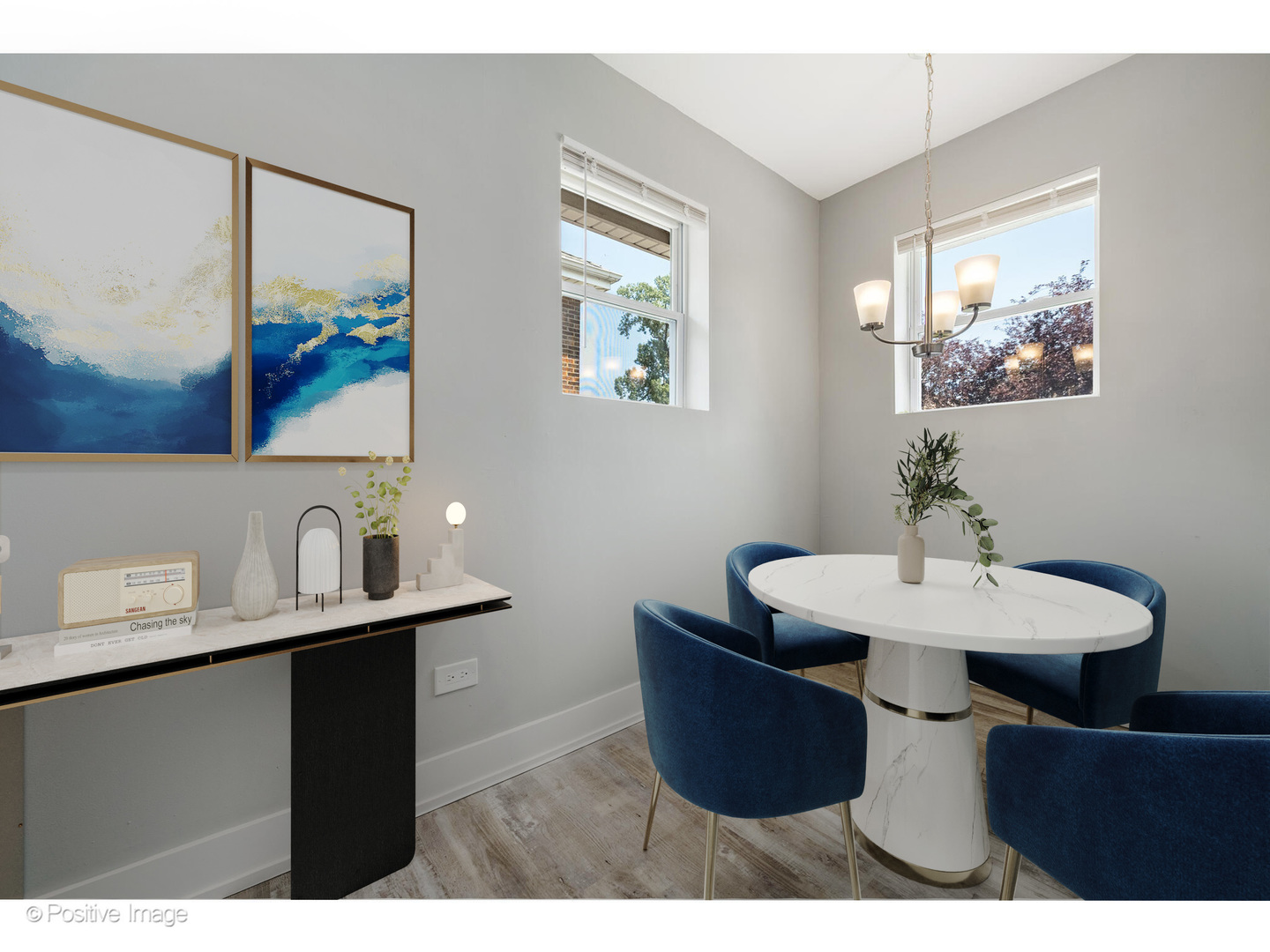 8446 South Constance Avenue Chicago, IL 60617 - Photo 7 of 14 a dining room with a table and chairs