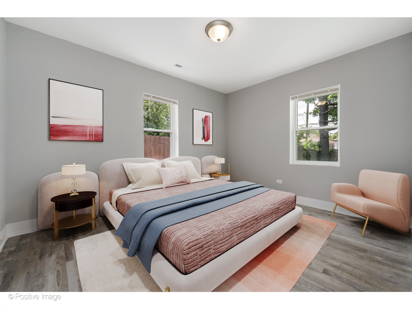 8446 South Constance Avenue Chicago, IL 60617 - Photo 10 of 14 a bedroom with a bed and wooden floor