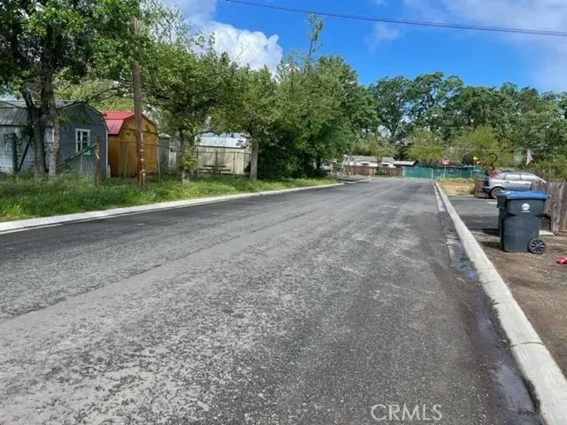 a view of street with houses
