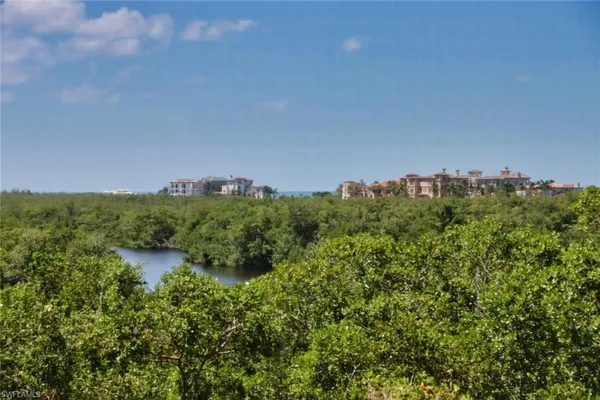 a view of a lake with a city