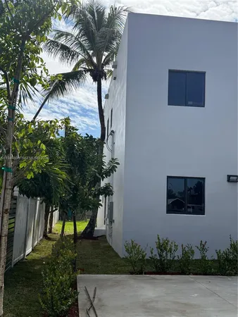 a house view with a garden