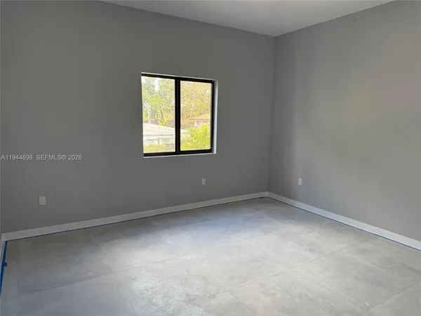 an empty room with a window