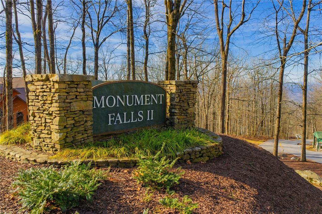 0 High Cliff Road Jasper, GA 30143 - Photo 10 of 10 a sign that is sitting on a brick wall