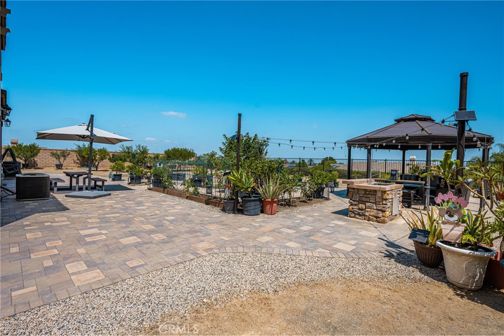 12652 Twin Peak Court Riverside, CA 92503 - Photo 42 of 55 a view of a patio with furniture and a table