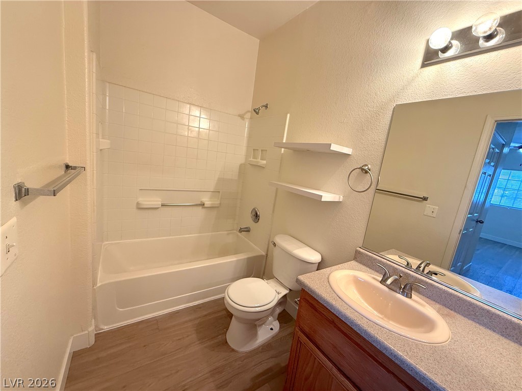 4730 East Craig Road, Unit 1164 Las Vegas, NV 89115 - Photo 10 of 14 A well-maintained bathroom with essential fixtures and light-colored flooring.