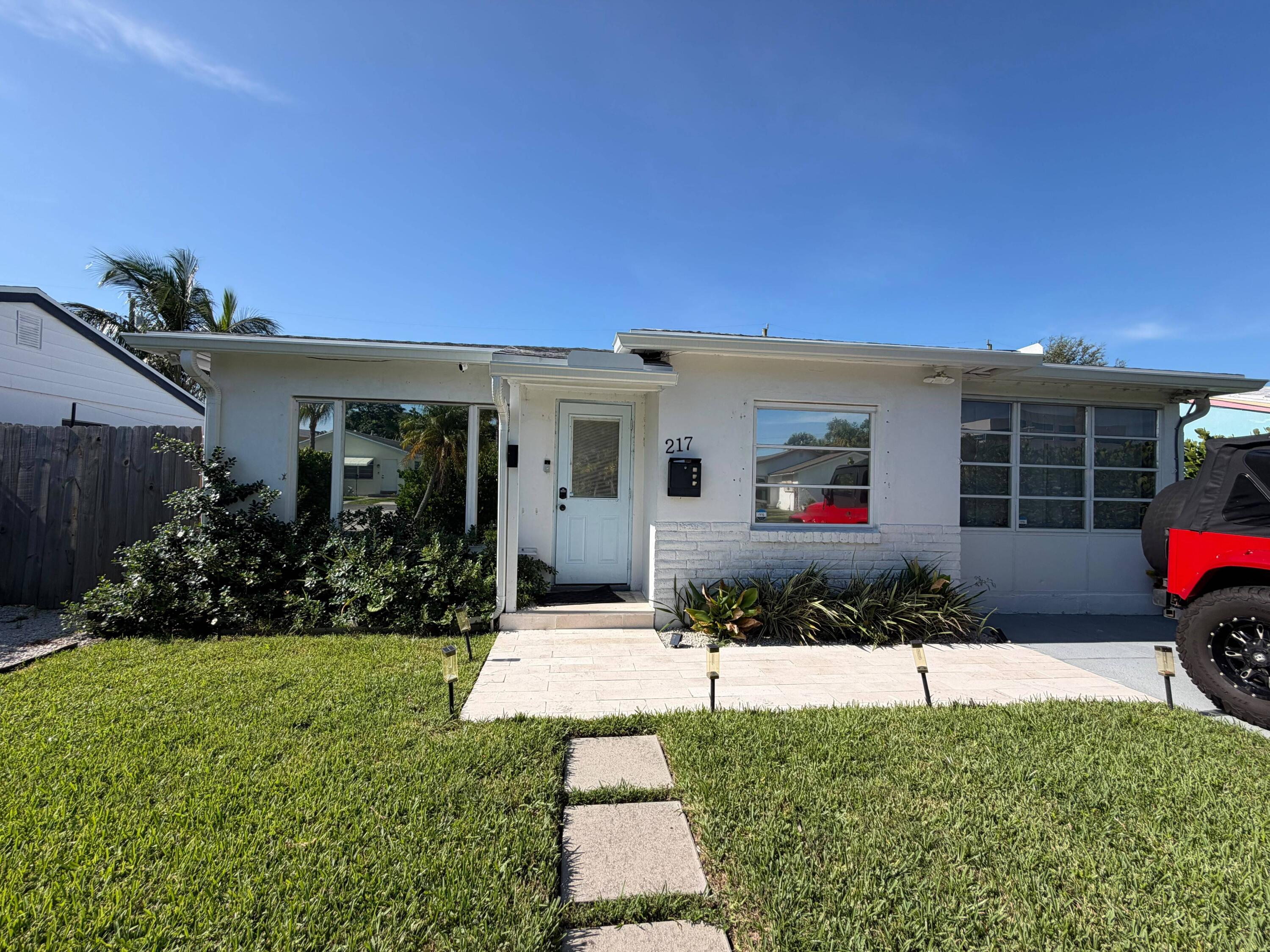 217 East 24th Street Riviera Beach, FL 33404 - Photo 1 of 17 WhatsApp Image 2026-08-13 at 09.13.18