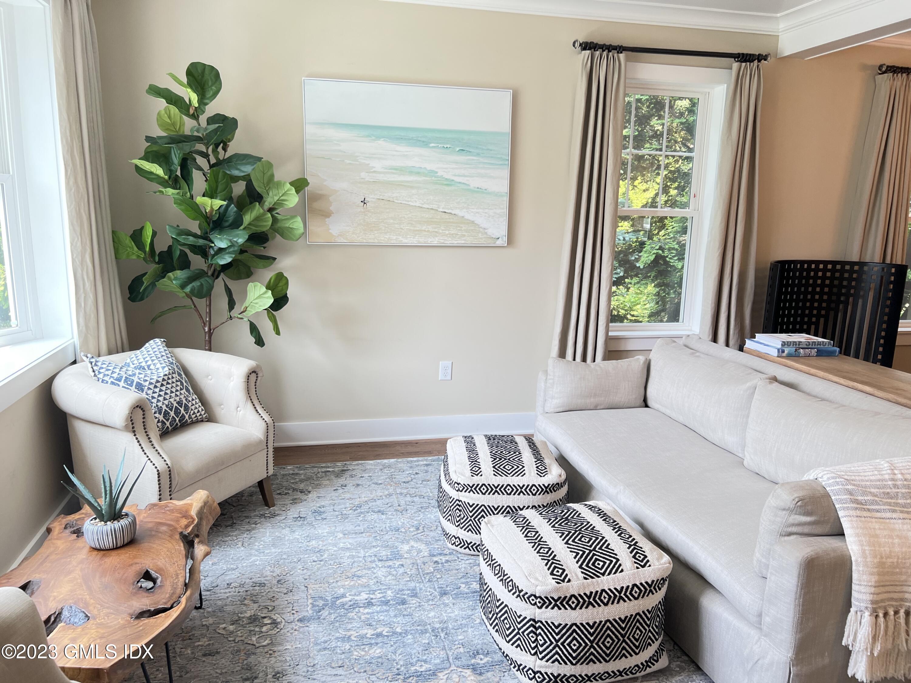 9 Center Road Old Greenwich, CT 06870 - Photo 2 of 26 a living room with furniture and a potted plant