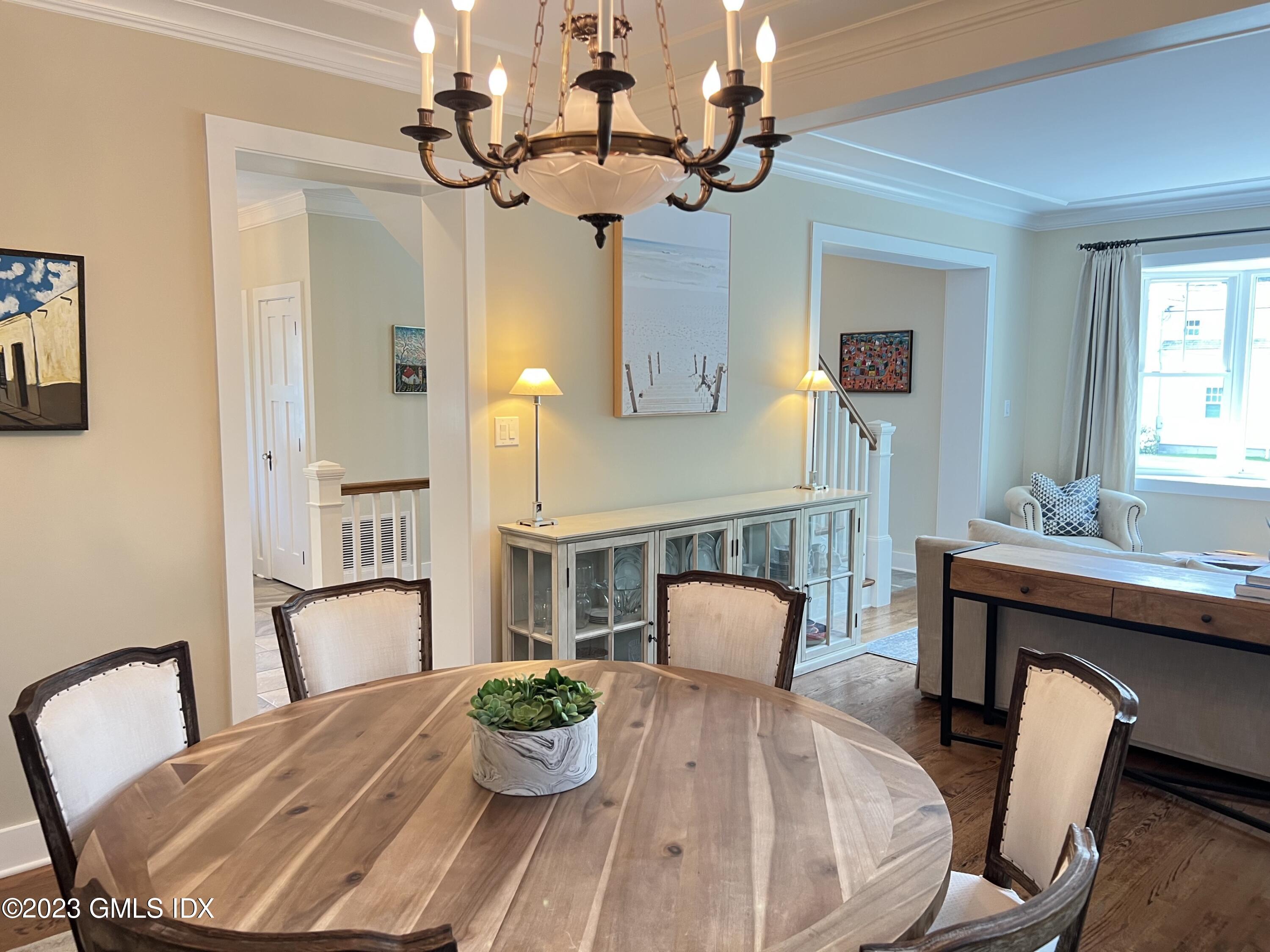9 Center Road Old Greenwich, CT 06870 - Photo 4 of 26 a view of a dining room with furniture window and wooden floor